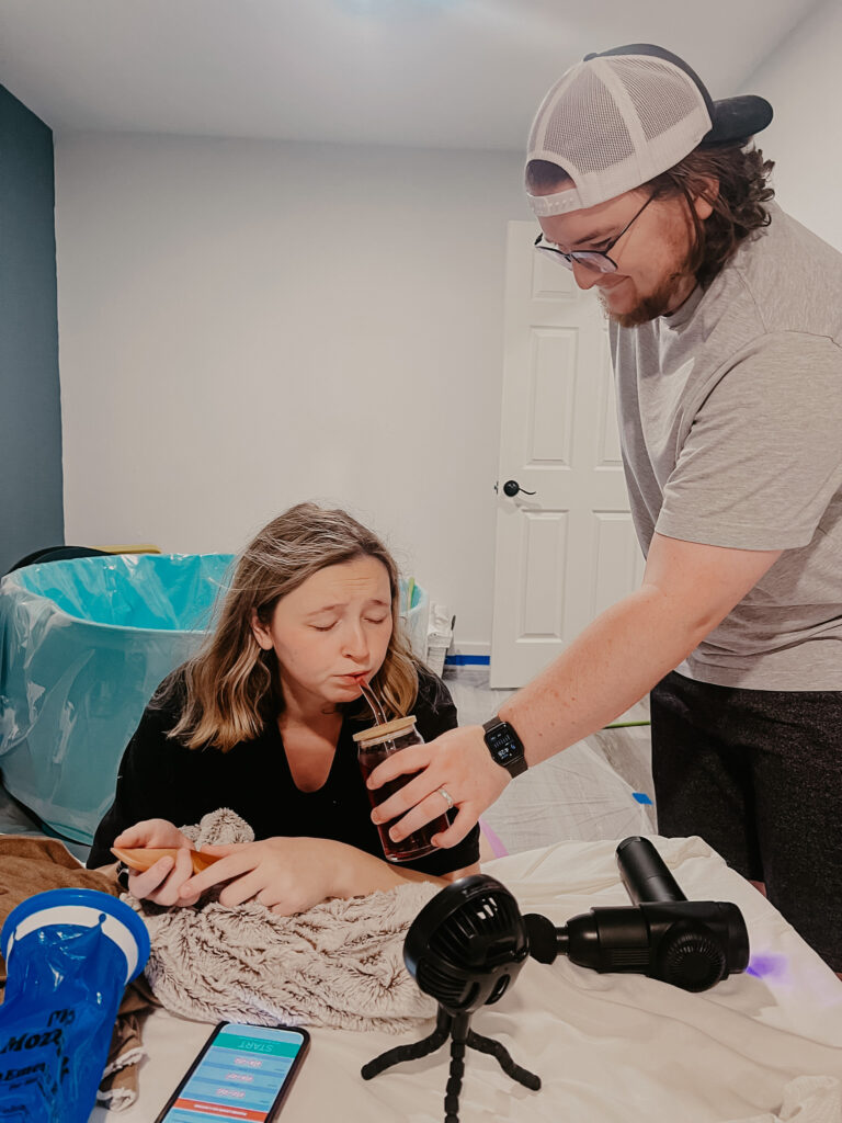 early active labor, my husband encouraging me to drink water